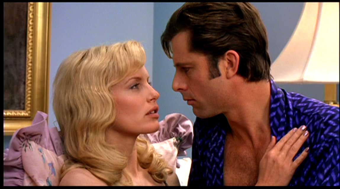 Daryl Hannah and Maxwell Caulfield in The Real Blonde